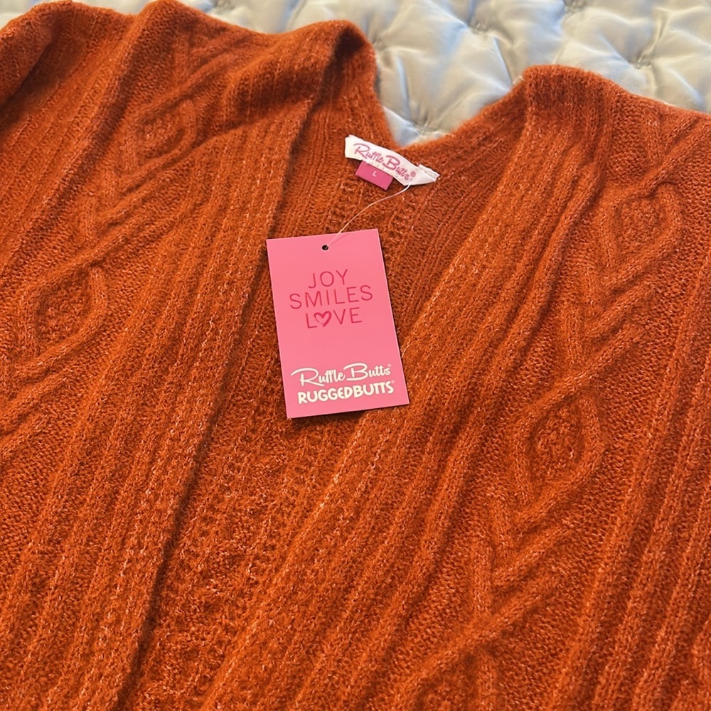 5 for 25$
Ruffle butts ladies cable knit sweater NWT - Picture 3 of 4